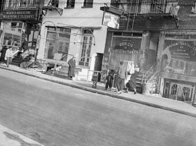 "Italian Restaurant, Mulberry Street. The name Gorizia appears on window. 1935-1941."